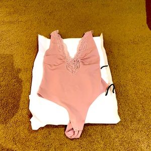 Taupe bodysuit pretty under blazer or sweaters.